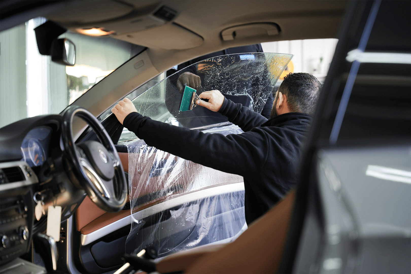 Security Levels Improved After Window Tinting Services Installation Work